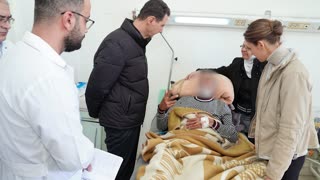 The Syrian President and his wife visit earthquake victims