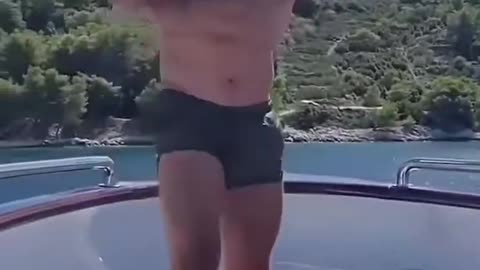 Andrew Tate Practice's Nunchucks on a Yacht
