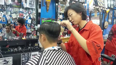 Men's haircut service at Boy Barbershop