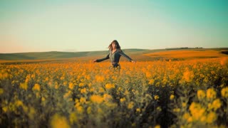 Women on field of flowers