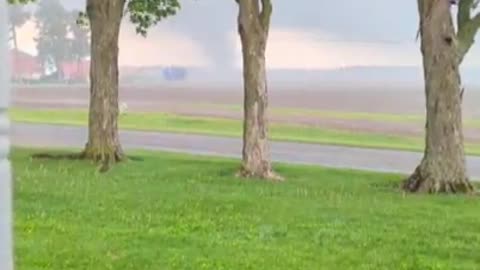 A tornado was spotted moving across the ground in Mendon, Mich