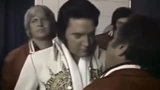 Elvis getting ready to take the stage at his last televised concert, 1977