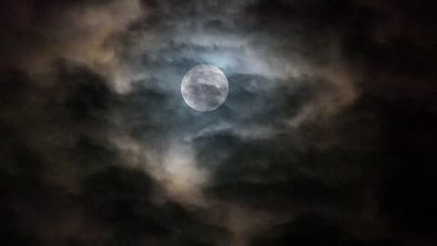 Moon And Clouds In The Night Sky