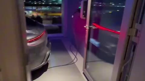 Car charging next to your bed in the 6th floor of a hotel !