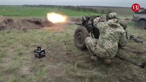 Image of destroyed Russian vehicles along road in Zaporozhye - tanks, armored vehicles...