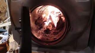 Wood burning hot water heater.