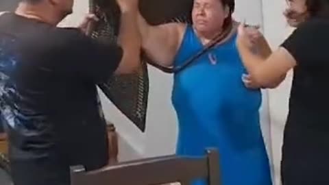 Woman Gets Stuck in Chair