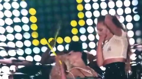 A pathetic Lady Gaga has a woman force vomit over her chest as she plays the drums...