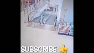 Guy Falls Down Escalator