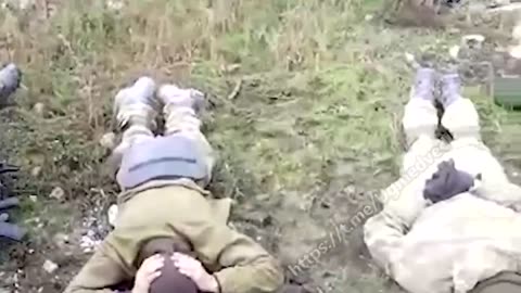 Russian troops captured Ukrainian POW