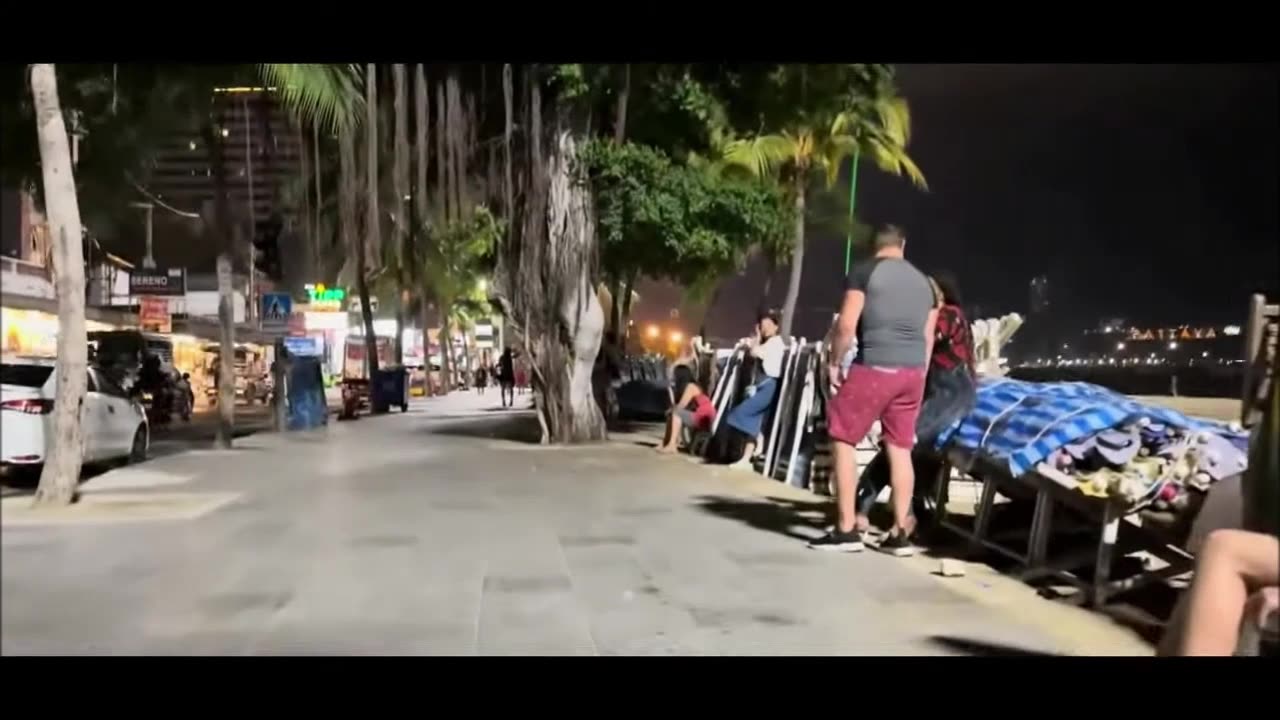 Thailand, Pattaya. Beach road with freelancers.