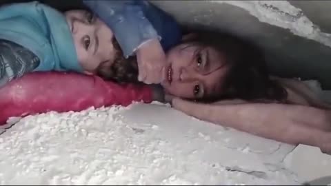 Heartbreaking scene of two children trapped under rubble in Syria and Turkey