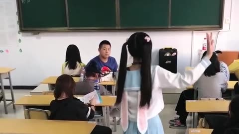 Little girl: The 16-year-old girl is dancing Daji in the classroom just as the principal comes