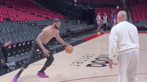 LeBron James and Phil Handy getting in some off-the-dribble work at shootaround