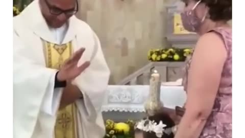 Toddler surprises the priest! Lol! :)