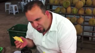 An Amerikan first time eating durian ever in Malaysia