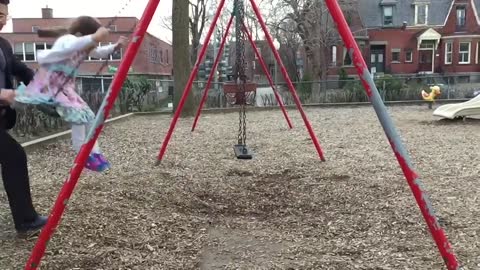 Awesome dad perfects swing stunt at the park