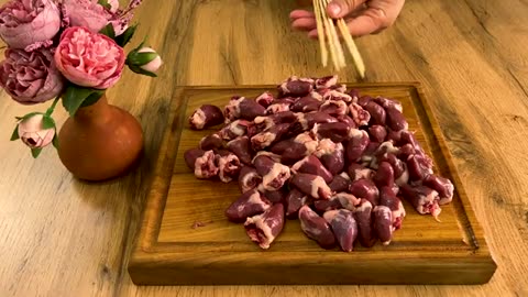 Grill chicken hearts in a pan. They will click like seeds. New recipe for Christmas.