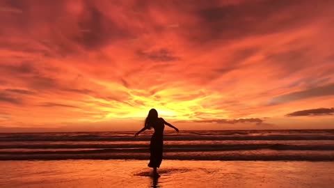 Walking on the seashore at dusk