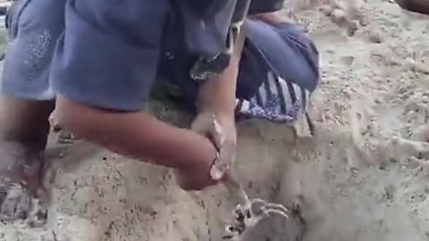 This boy playing crab