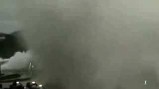 Huge waves hitting the coast of San Sebastian, Spain sends people scattering