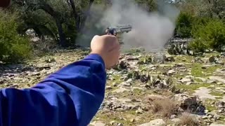 Shooting a Colt 1872 Open Top Revolver in 45 Colt from Taylors and Company