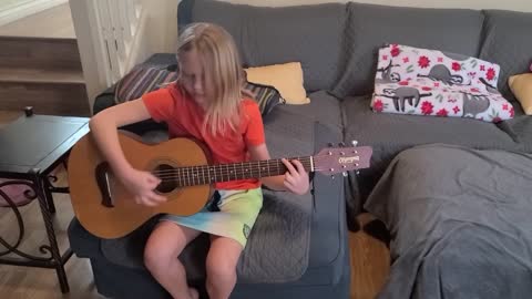 Zoey Playing Guitar