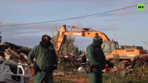 Migrant camp catches fire on demolition day