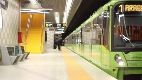 Subway train arriving at an underground station