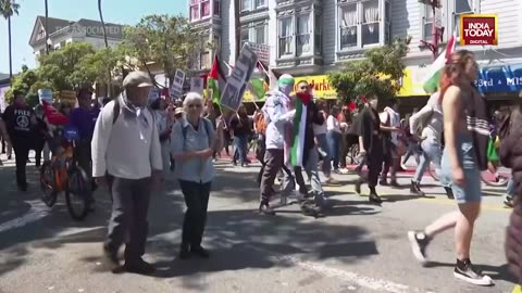 US May Day Protest: Worker Rights Groups Demand Higher Pay During May Day March In San Francisco