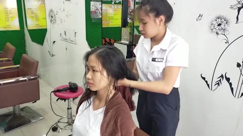 Relaxing shampoo at Vietnam barbershop is a pleasant experience