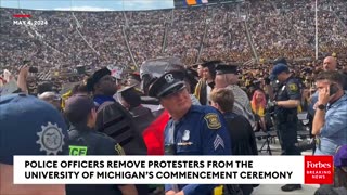 BREAKING: Police Officers Remove Protesters From The Univ.of Michigan’s Commencement Ceremony