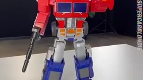 Optimus prime that can transform, do pushups and do martial arts