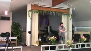 Pastor Adam preaching from Jeremiah