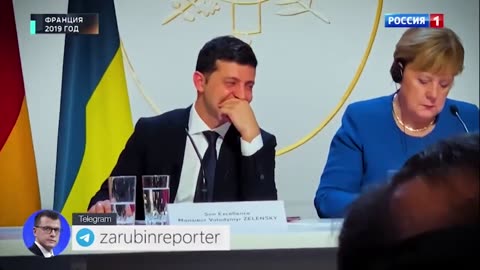 Zelensky laughs from Putin at the Minsk Accords in 2019 in Paris.