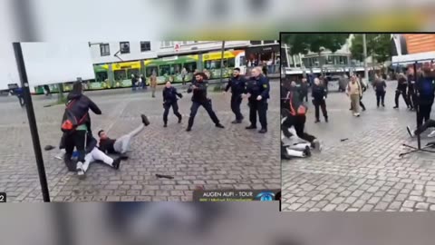 Muslim Attacks Public Speaker in Mannheim Germany with a Knife (Two Camera Angles - Side by Side)