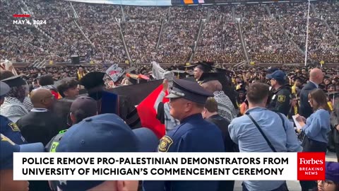 University of Michigan respond to pro-Palestinian protesters at commencement by chanting "USA USA.
