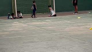 Little Boy Trips Over Ball While Trying to Make Goal