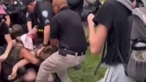 US police brutally attacking women peacefully protesters.