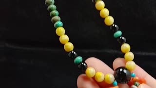 Natural turquoise and bumble bee beads with onyx spiny oyster pendant necklace