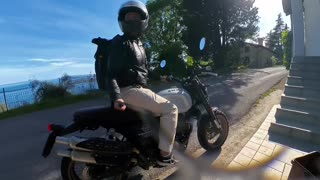 Motorcyclist's Camera Smashes Into Roadside Planter