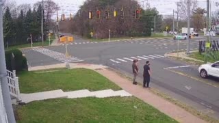 Two quick thinking barbers save a child about to run into traffic