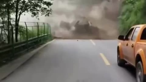 Massive landslide blocks a road in China