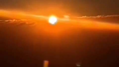 A Video Of The Sun in The Clouds Taken From A Airplane