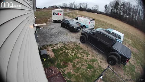 FedEx Driver Backs Into Parked Vehicle