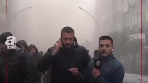 Reporter caught another building falling down in Turkey Earthquake