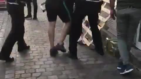 Belgian police attempt to arrest a criminal and are nearly lynched by an Islamic