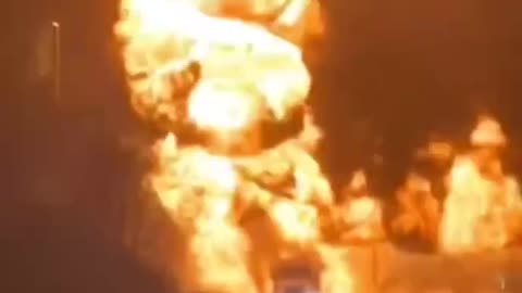 A massive explosion and fire has engulfed a petroleum truck beneath the