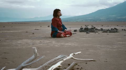 Meditating in a windy desert environment