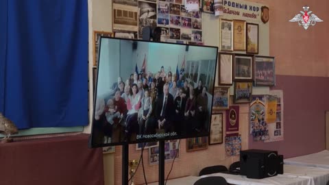 Russian soldiers talk to their families and friends via videoconference